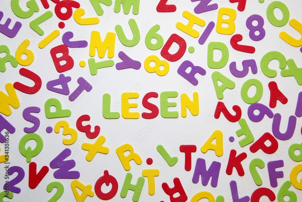 Fototapete german word lesen - reading - and seamless pattern with letters of the alphabet and numbers in rando