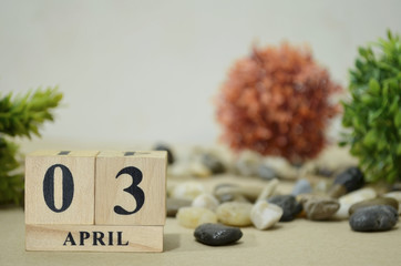 April 3, Number cube design in natural concept.