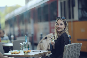 street cafe girl spring view, seasonal cafe beautiful model posing