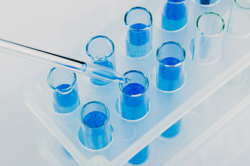 A pipette that adds fluid to one of several tubes. Lab tests