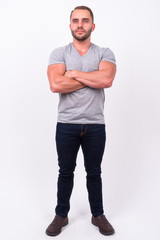 Fototapeta premium Full body shot of muscular bearded man