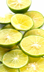 Lemon slices are stacked, isolated on a white background.