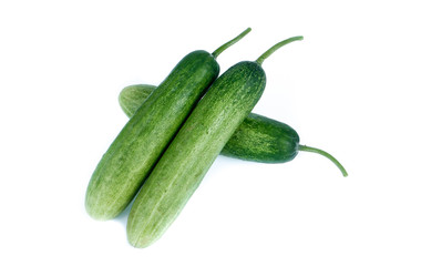Cucumber and slices isolated over white background