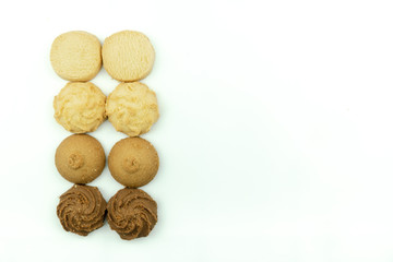 Premium butter cookies isolated on white background with copy space. Shallow depth of field.