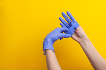 Step-by-step instructions on how to remove dirty gloves, doctor take off from hand glove