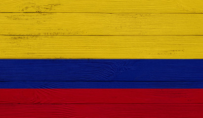 Colombia flag on a wooden texture. Wood texture, planks Wooden texture background flag. Flag painted with paints on wood