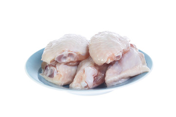 Raw chicken  on cutting board on white background
