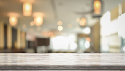 3D Rendering, Wooden top table with bokeh light effect and blur restaurant on background, blur background