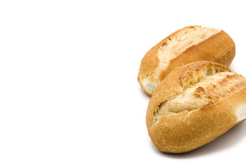 Baked small breads isolated on white background. Copy space