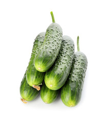 Green cucumbers on white background