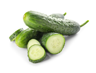 Green cucumbers on white background