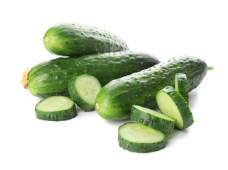 Green cucumbers on white background