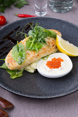White fish cutlet served with caviar