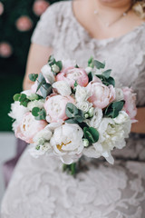 bride holding bouquet of flowers