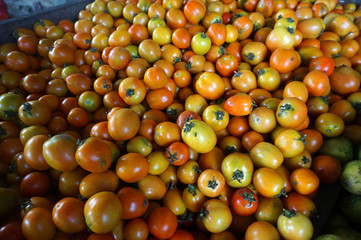 Fresh  tomatoes sell in traditional market indonesia.