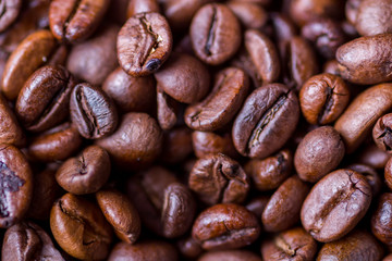 Texture of coffee beans close-up view from above