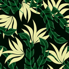 Summer seamless tropical pattern with bright plants and leaves on a black background. Beautiful seamless vector floral pattern. Exotic wallpaper. Beautiful print with hand drawn exotic plants.