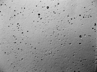 
The concrete wall of the building. Blurred defocused background for web design.