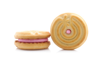 sandwich cookies with strawberry cream on white background