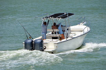 Obraz premium fishing boat cruising the Florida Intra-Coastal Waterway off Miami Beach.