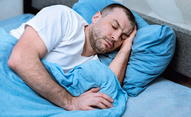 Mature Guy Sleeping In Cozy Bed At Home During Quarantine