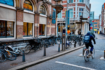 Lots of bikes on the sidewalk. The Hague, The Netherlands.