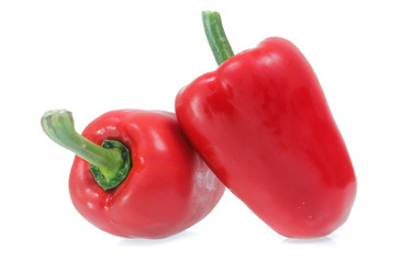 peppers with white background. Cut in half with slices
