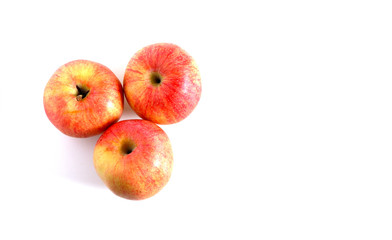 Juicy red apples on a white background.