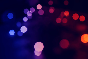 Lights red and blue in bokeh. colorful background purple.