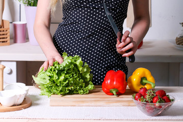 woman making fruits smoothies with blender. Healthy eating lifestyle concept , strawberry at home in kitchen.