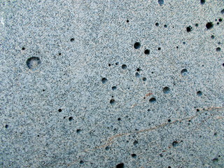 
The concrete wall of the building. Blurred defocused background for web design.