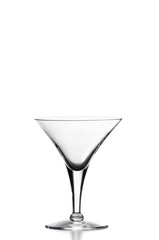 A single martini glass isolated over a white background with copy space on top.