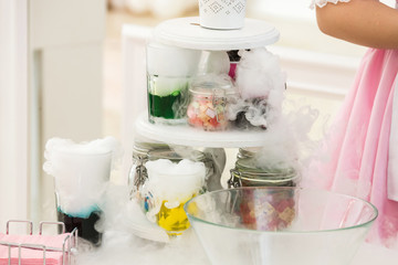 science show at a children's party, cooking with dry ice, smoke, steam, multi-colored drinks