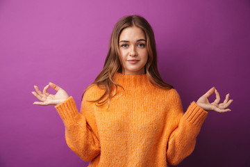 Image of happy young woman meditating with keeping fingers together