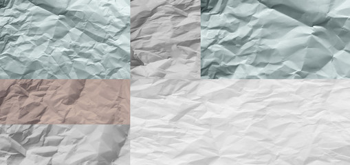 White and multicolored wrinkled paper surface, top view