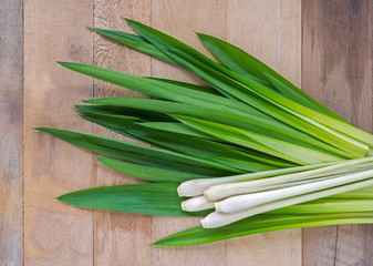 Lemongrass leaf and fresh pandan leaves on wooden tabel