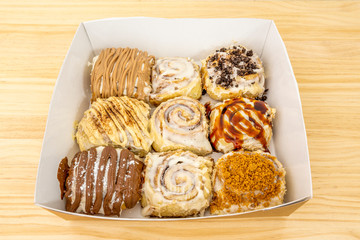 box with assorted cinnamon rolls