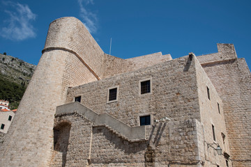 Fototapeta na wymiar Part of the wall and stone steps in Dubrovnik, Croatia, Europe.
