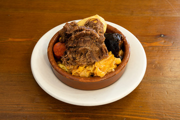 clay casserole with full Madrid stew
