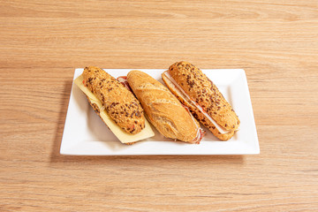 cold mini sandwiches of various flavors