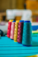 Set of tailoring tools and accessories on table