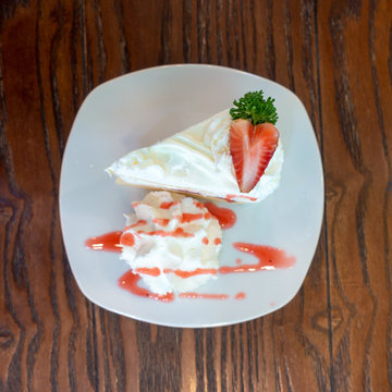 Strawberry crape cake top view on wooden