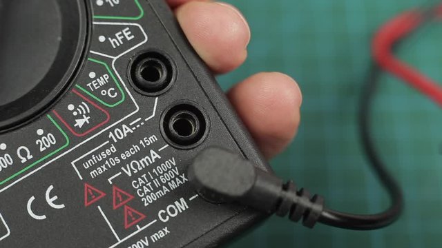 Electronic multimeter tool. Ready for voltage measuring. Close up