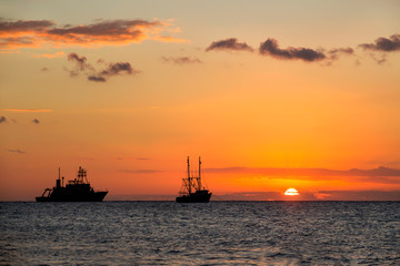 Sunset and ships in the Caribbean Sea