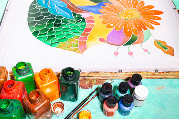 paints and silk canvas with floral batik ornament