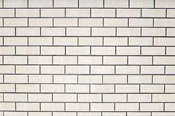 Beige clean brick wall with copy space
