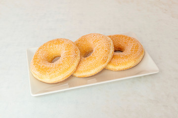 tray with sugar donuts