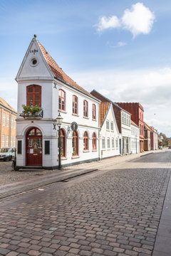 Denmark, Ribe, Town houses along cobblestone street