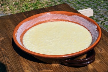 Preparation of rice cake, a typical dessert from northern Tuscany