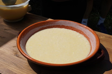 Preparation of rice cake, a typical dessert from northern Tuscany